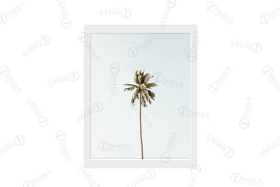 A single palm tree with a light blue sky background digital artwork showcased in a frame.