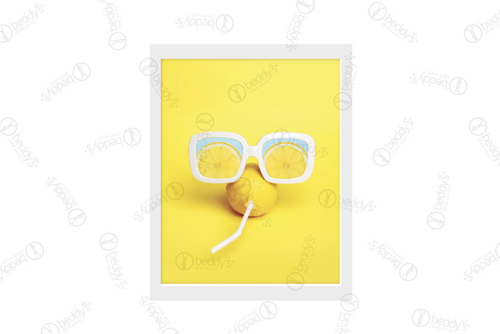 A lemon with a straw poked through it and white sunglasses on top of it digital artwork showcased in a frame.