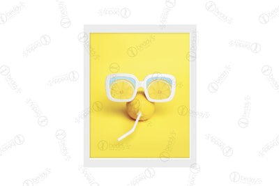 A lemon with a straw poked through it and white sunglasses on top of it digital artwork showcased in a frame.