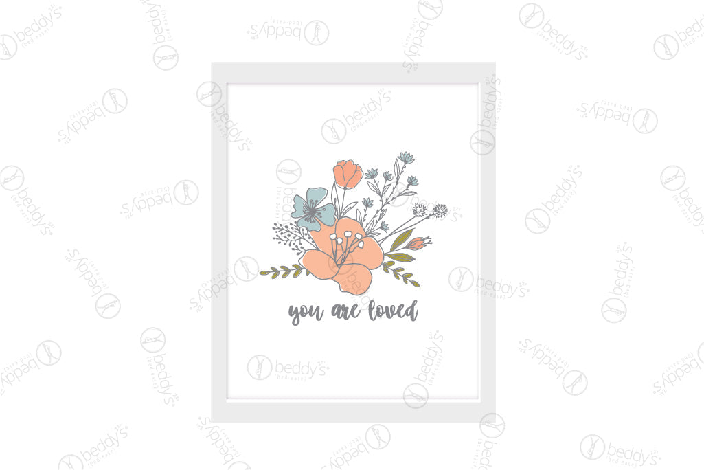 A blue, green, and peach floral arrangement and graphic cursive lettering stating "you are loved" digital artwork showcased in a frame. 