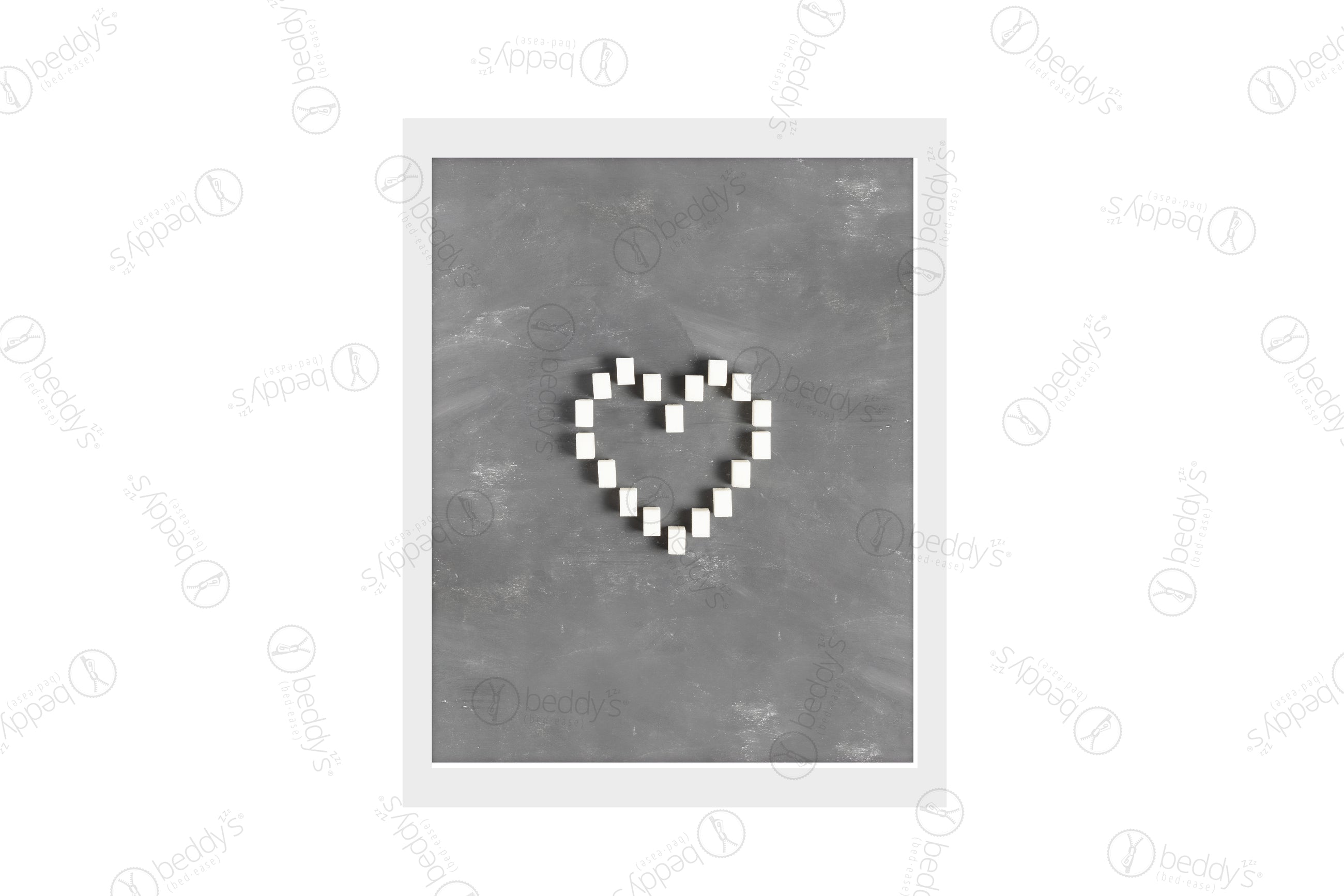 Multiple white sugar cubes making a heart with a gray background digital artwork showcased in a frame.