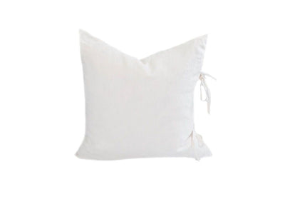 White euro pillow with ties on the end