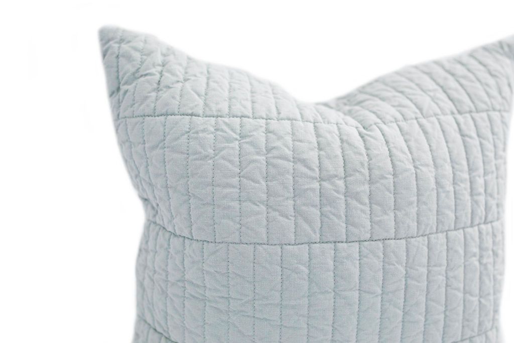 Close up of Light blue quilted pillow cover