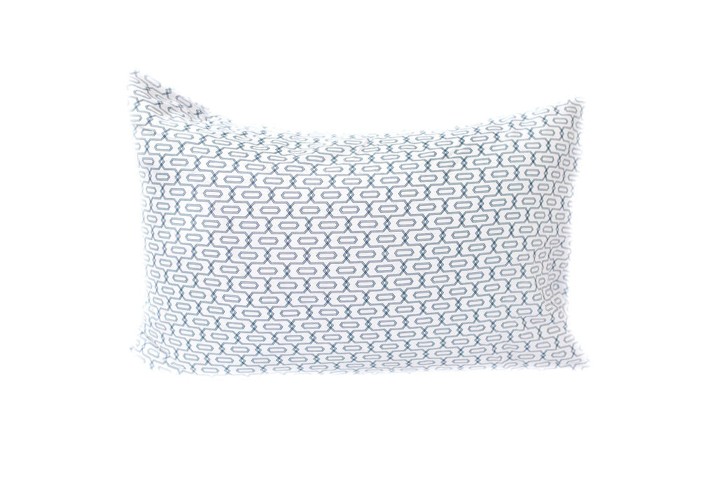 White and blue patterned pillowcase 