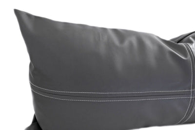 Close up of black faux leather lumbar pillow