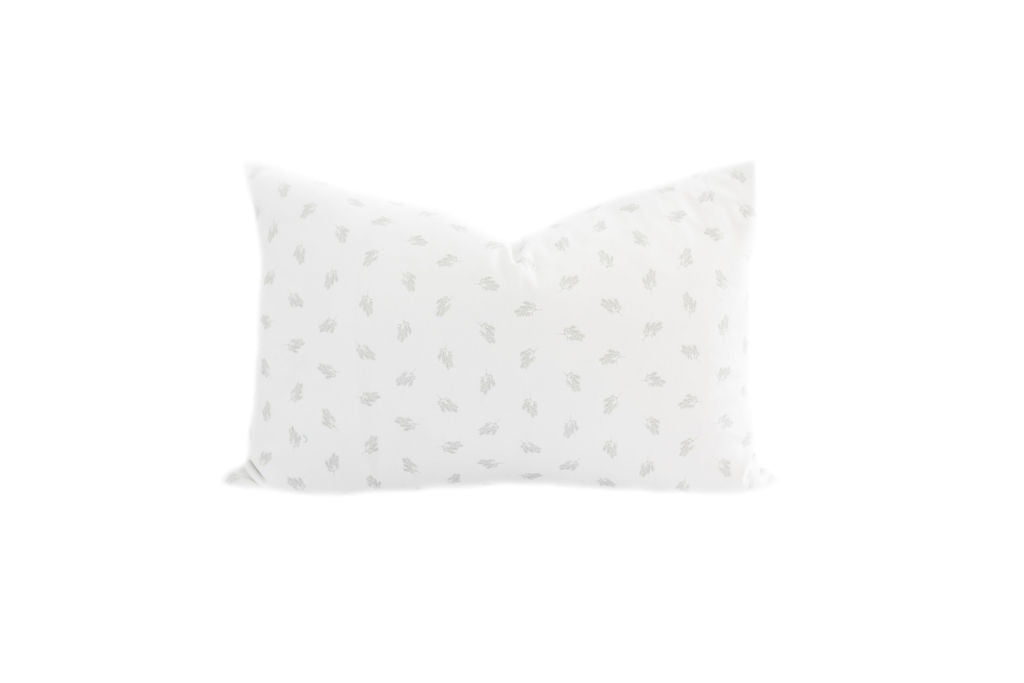 White and gray patterned lumbar pillow