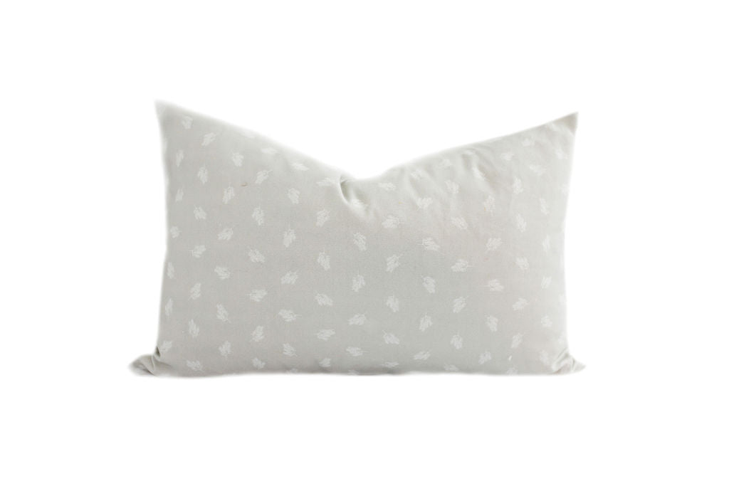 Gray and white patterned lumbar pillow