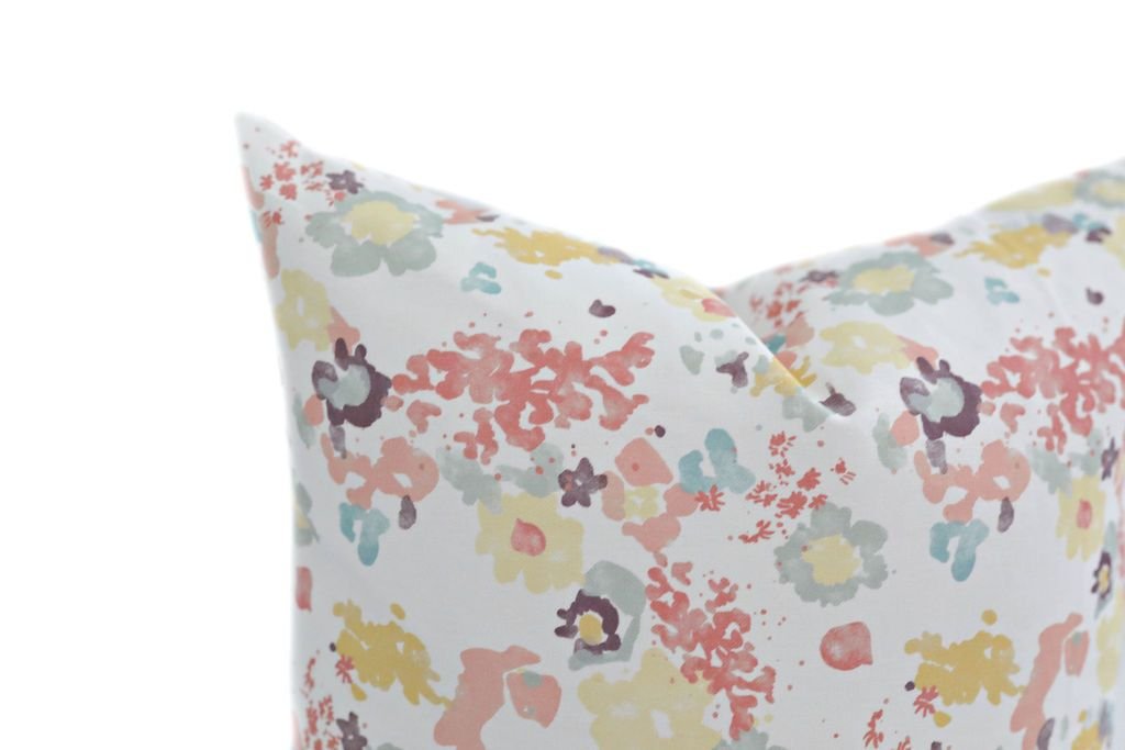 Close up of pastel floral pattern decorative pillow