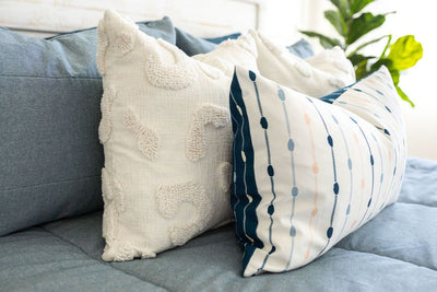 Blue zipper bedding with blue white and graphic pillow