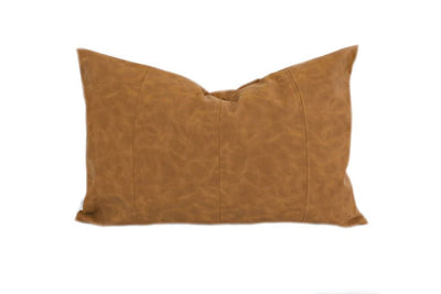A vegan leather brown lumbar pillow on a white background.