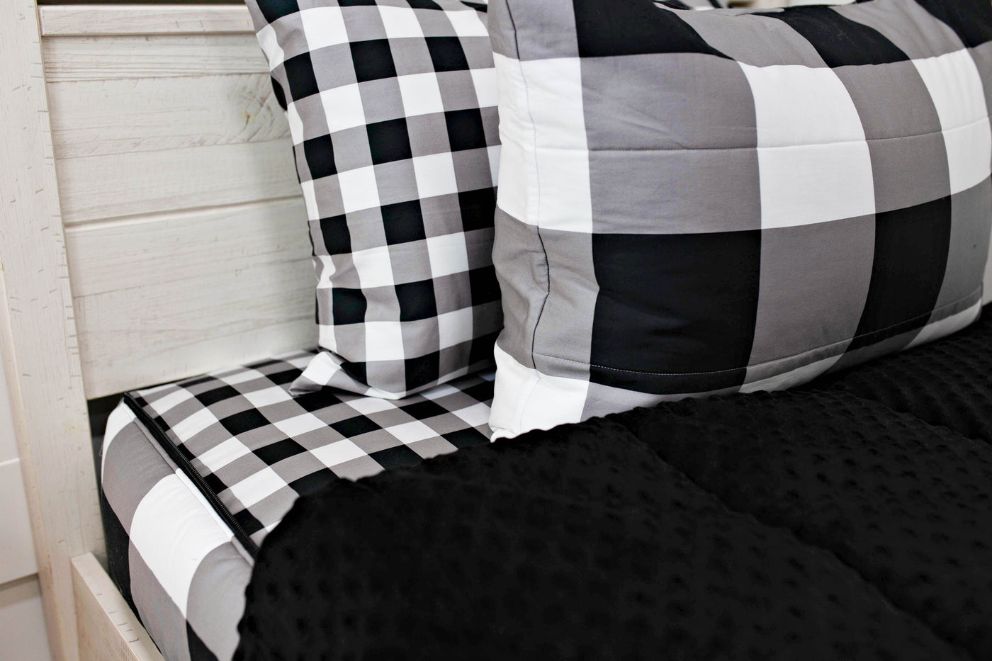 Black and white pillow case and sham on black and white checker zipper bedding with black minky inner lining 