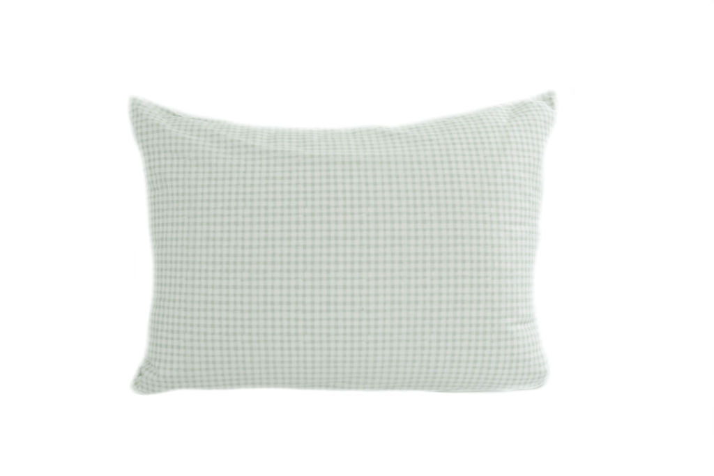 A light green plaid pillowcase.