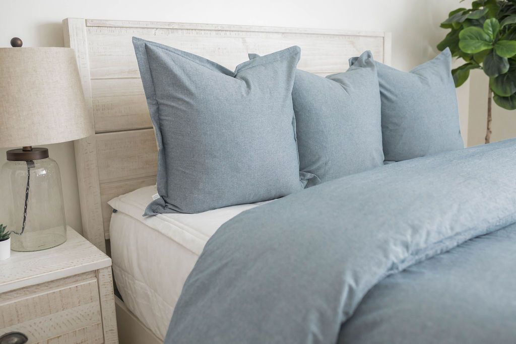 Light blue matching pillow and duvet on white zipper bedding