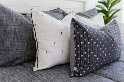 Gray charcoal zipper bedding with gray, black and white pillows