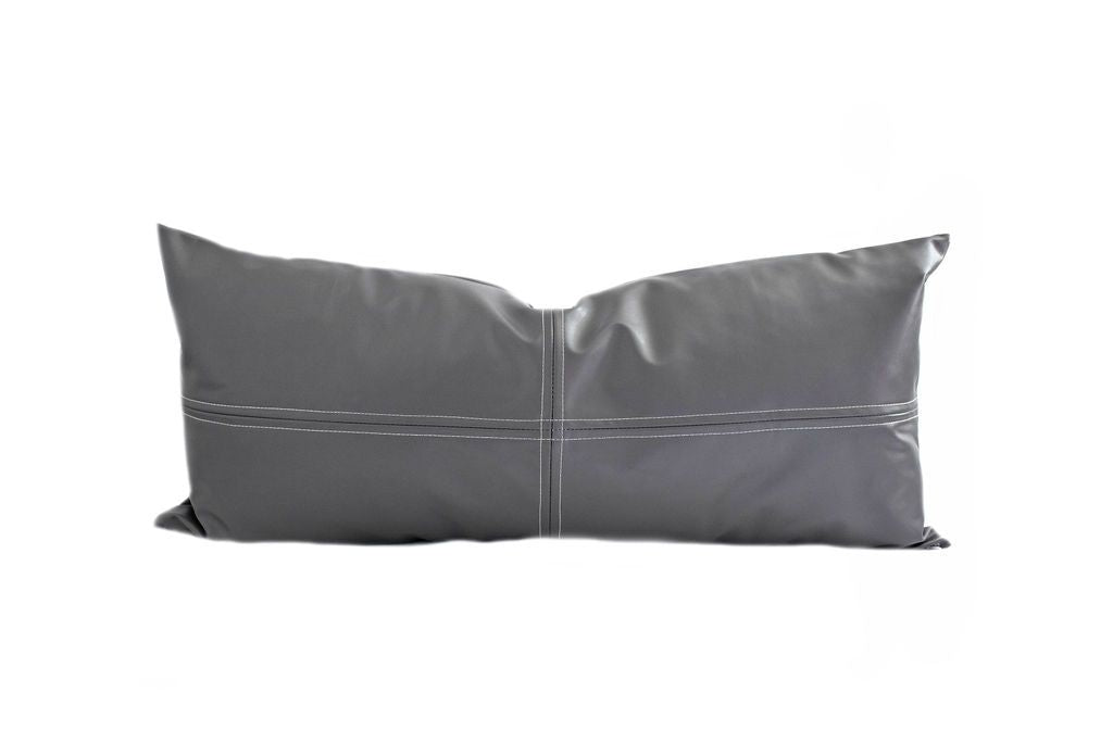 A charcoal black faux leather lumbar pillow.
