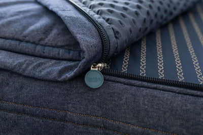 Unzipped blue zipper bedding showing minky inner lining
