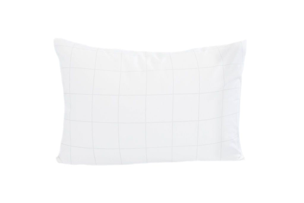 A white pillowcase with faint light gray grid pattern.
