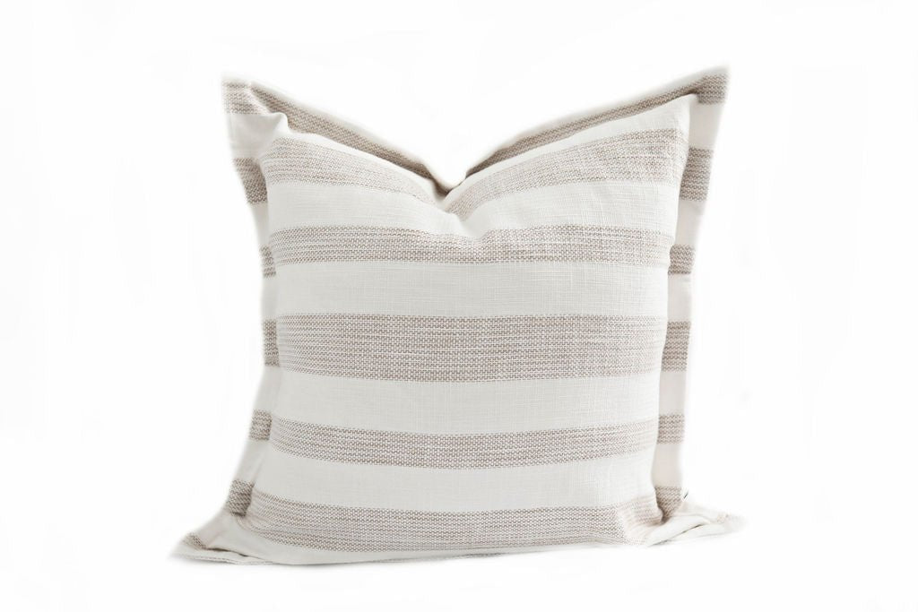 A cream and tan striped large pillow on a white background.