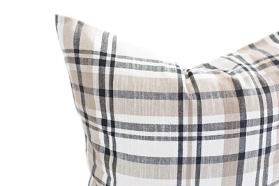 Close up of Cream, gray and white plaid pillow