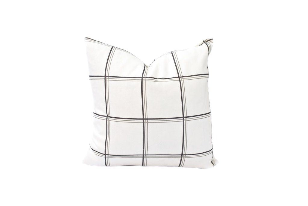 White and gray plaid pillow