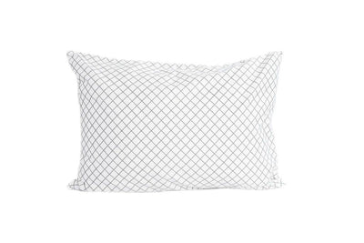 white pillowcase with moss green diamond design in repeating pattern