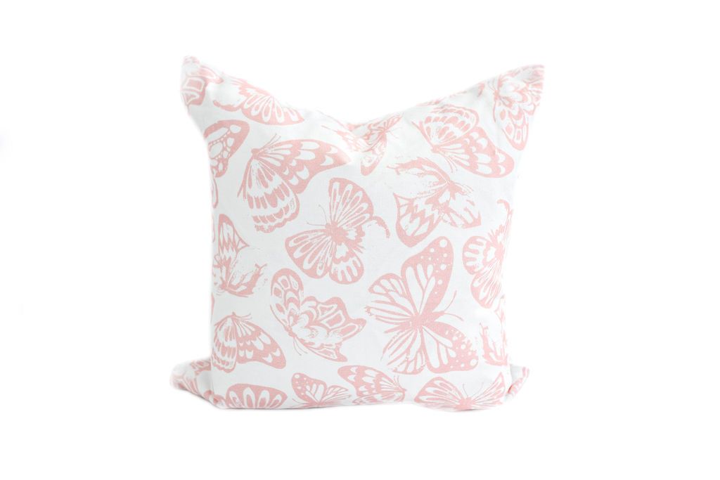 White and pink butterfly pillow