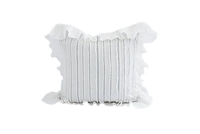 Blue/gray textured pillow with ruffle along the edge