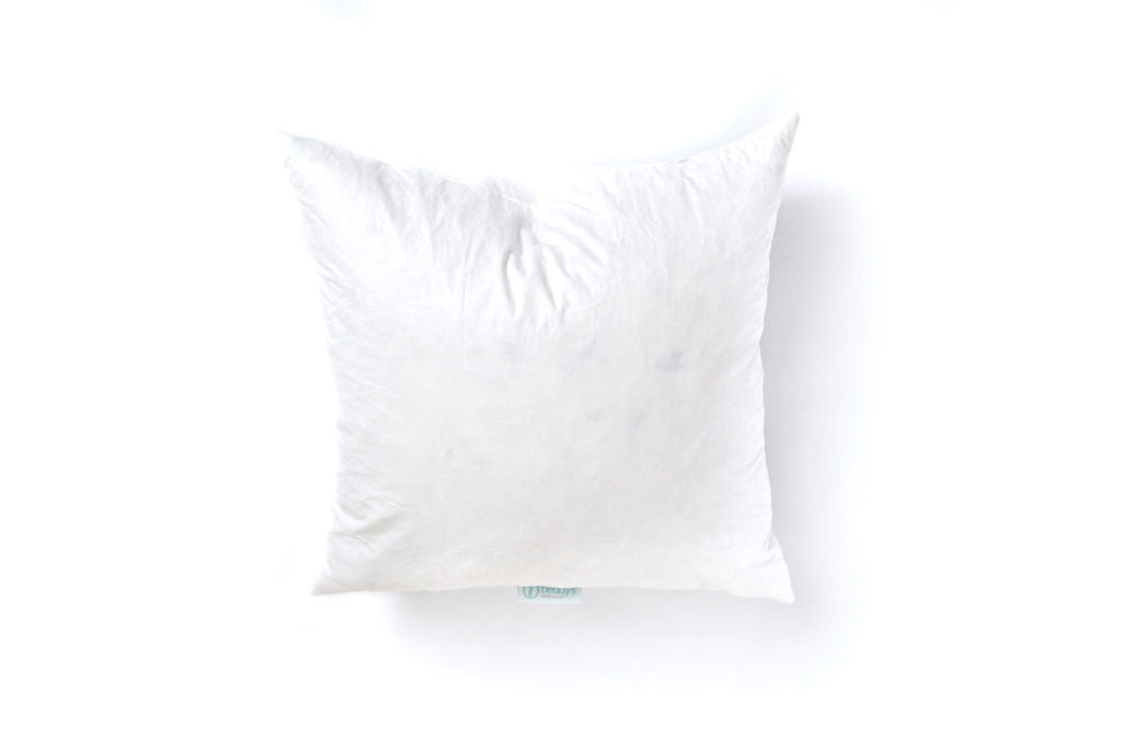 A medium white feather pillow insert. 