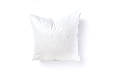A medium white feather pillow insert. 