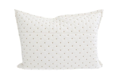 A cream sham pillow with light brown stitching.