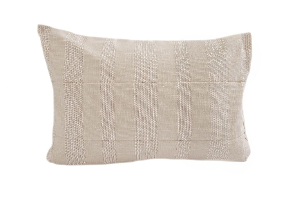 Neutral tan pillow sham with woven white stripes