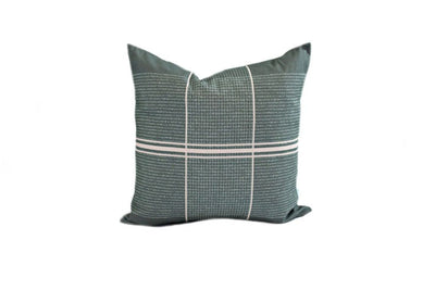 green pillow with cream stripe grid pattern