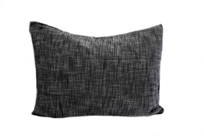 A charcoal gray pillow sham.
