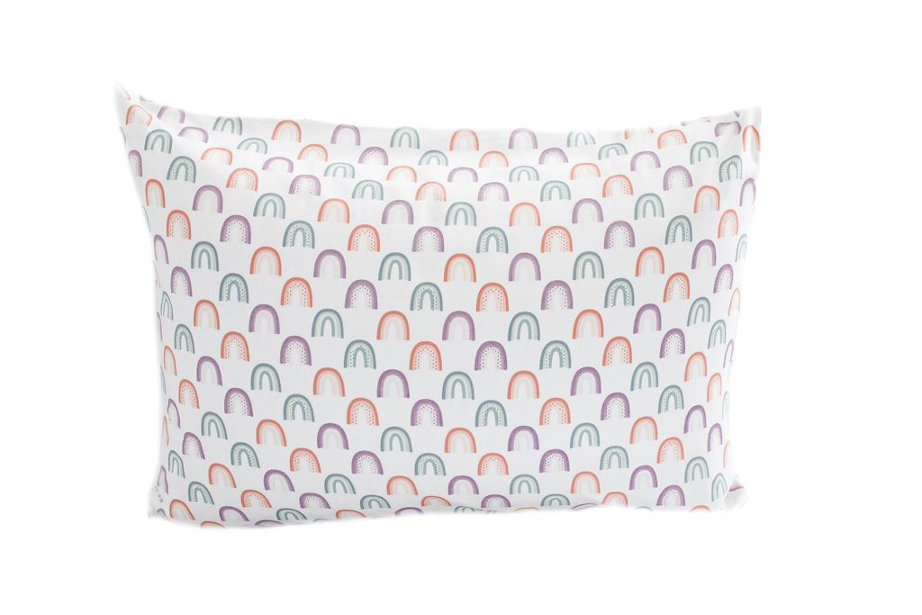 A white pillowcase with purple, orange and green ombre rainbows. 