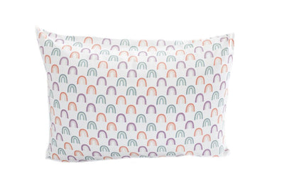 A white pillowcase with purple, orange and green ombre rainbows. 