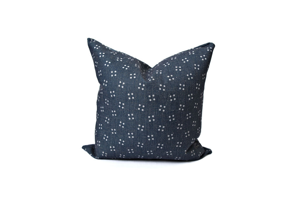 Blue denim pillow with white spots 