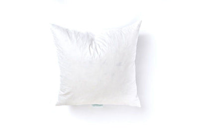 A white medium feather pillow insert.