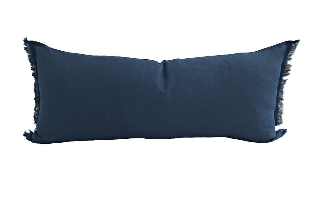 Blue xl lumbar pillow with thin fringe on edges